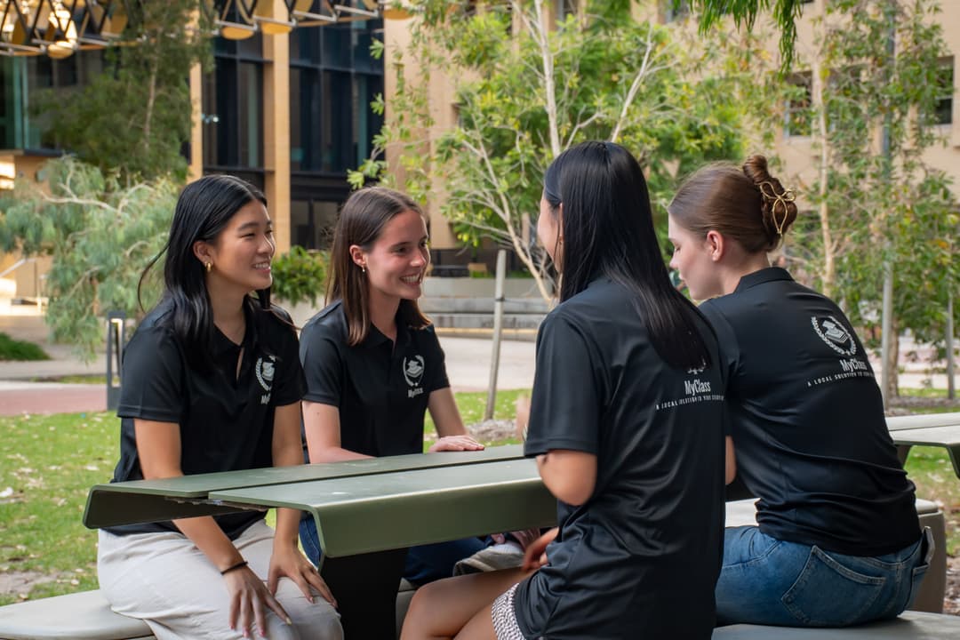 Tutor teaching student